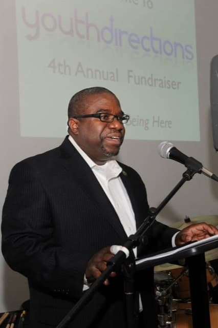 Dr. Nate Easley, Jr. speaking at a Youth Directions fundraiser